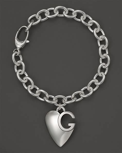 gucci heart bracelet with interlocking g|Gucci sterling silver charm bracelet.